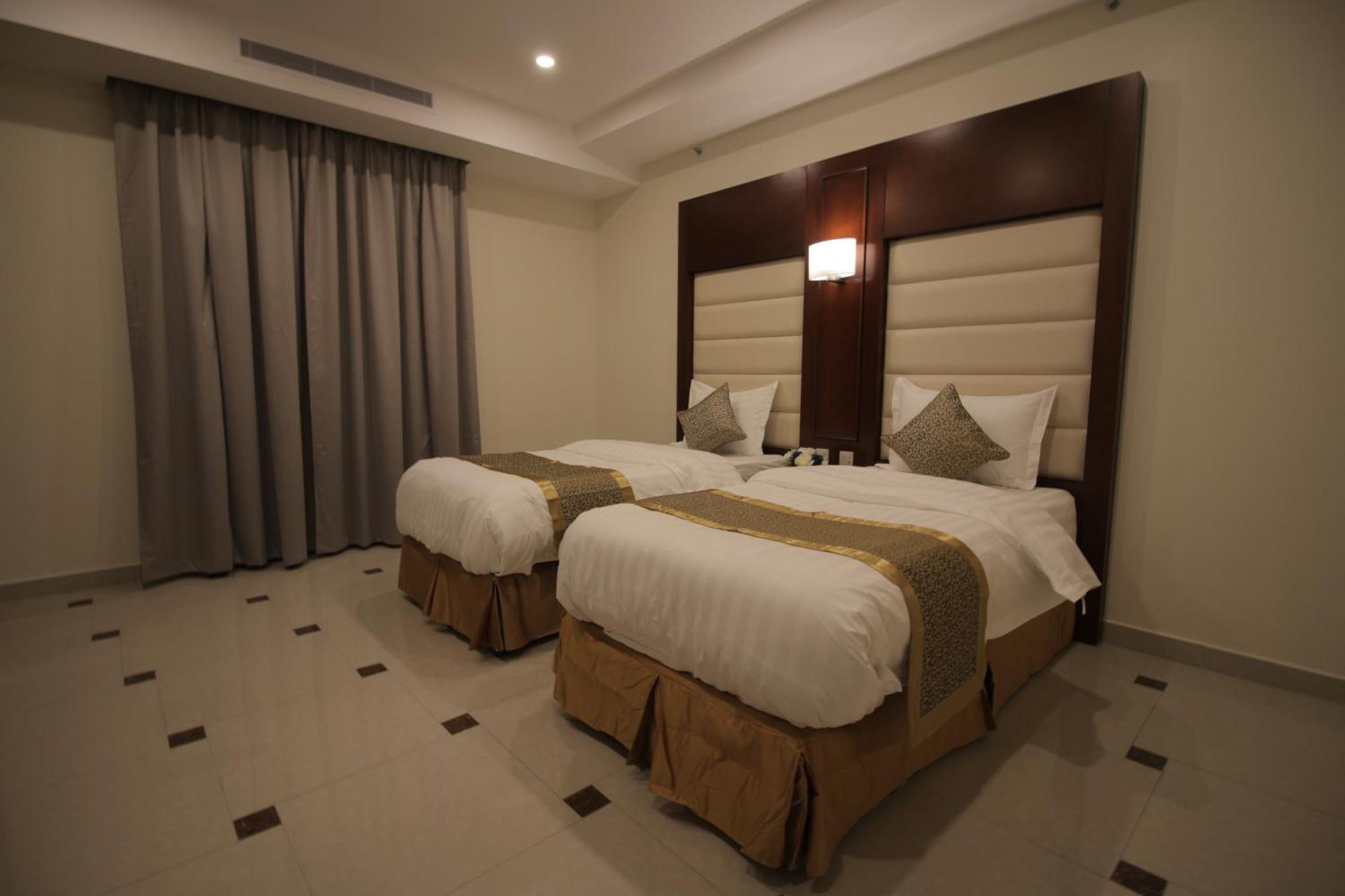 Nukhbat Al Makan Apartment Hotel 塔伊夫 客房 照片